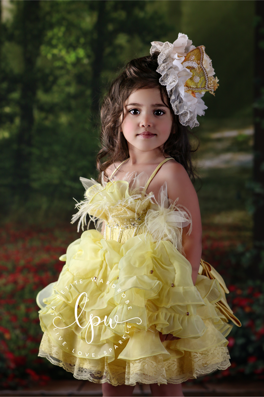 duchess satin with layers of chiffon and soft tulle decorated with hand sewed beading