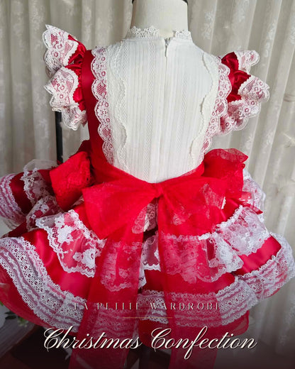 Back view of the Christmas Confection red taffeta girls Christmas dress with tulle sash