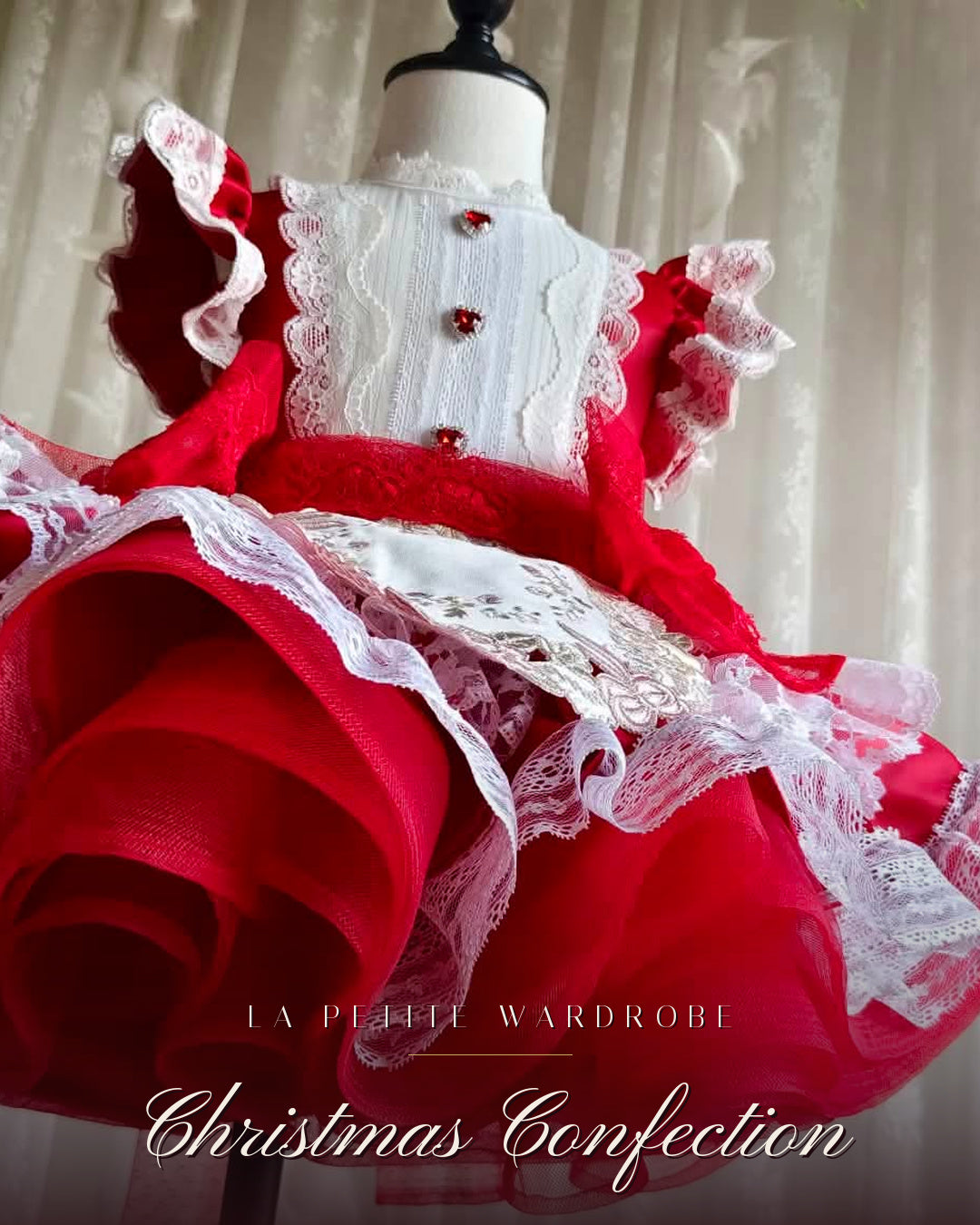 Close detail of the red taffeta skirt and ivory lace trim on the Christmas Confection dress