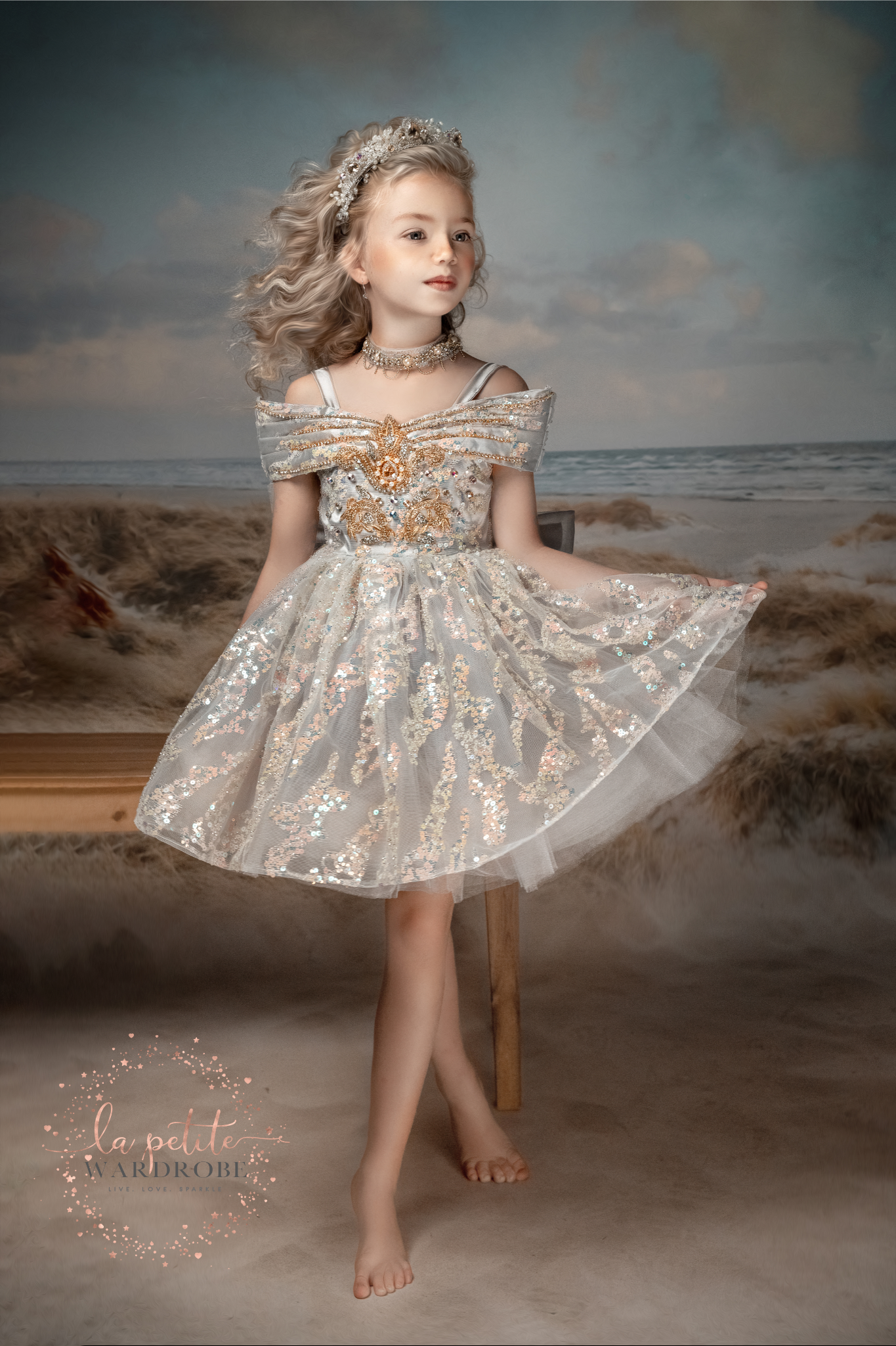 dress is made with sequin sparkly tulle and duchess satin with hand embroidered gold appliques decorated with colourful beads