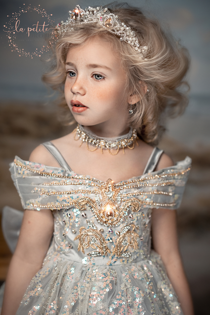 dress is made with sequin sparkly tulle and duchess satin with hand embroidered gold appliques decorated with colourful beads